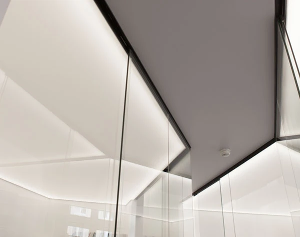 Construction detail of suspended ceiling and glass partitions