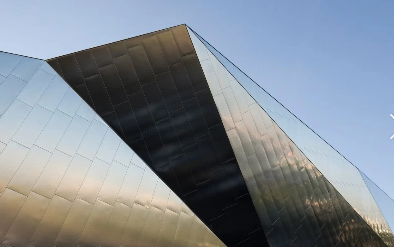 Construction detail of folded golden aluminum cladding